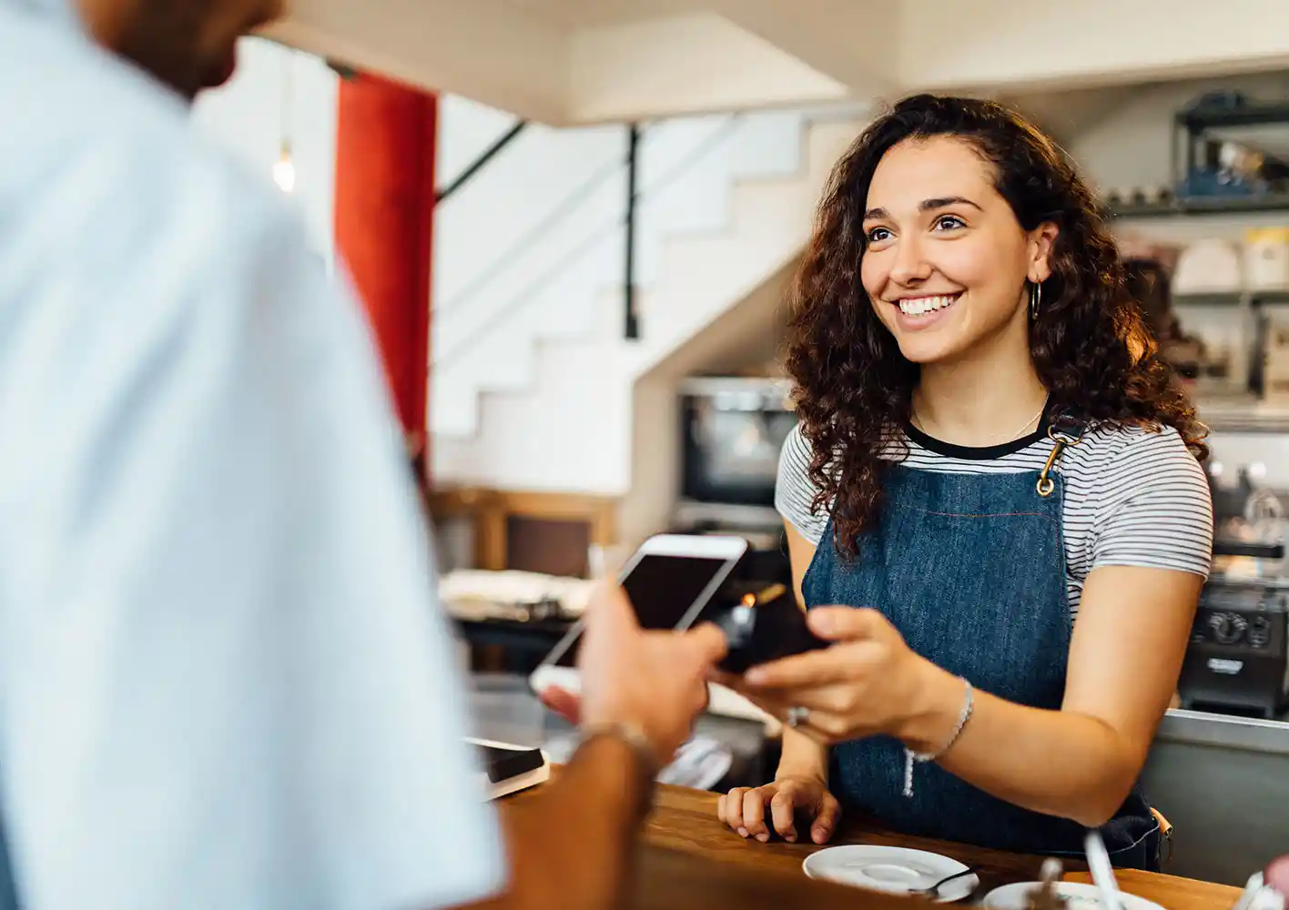 Smiling girl with mobile phone