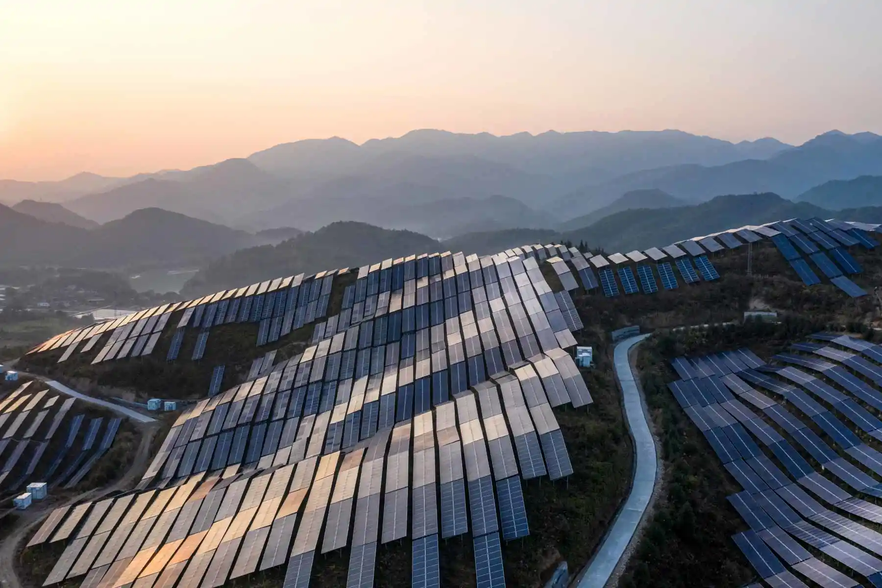 Solar panels with mountain background