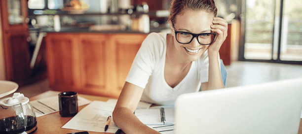 Picture of woman working on a computer.